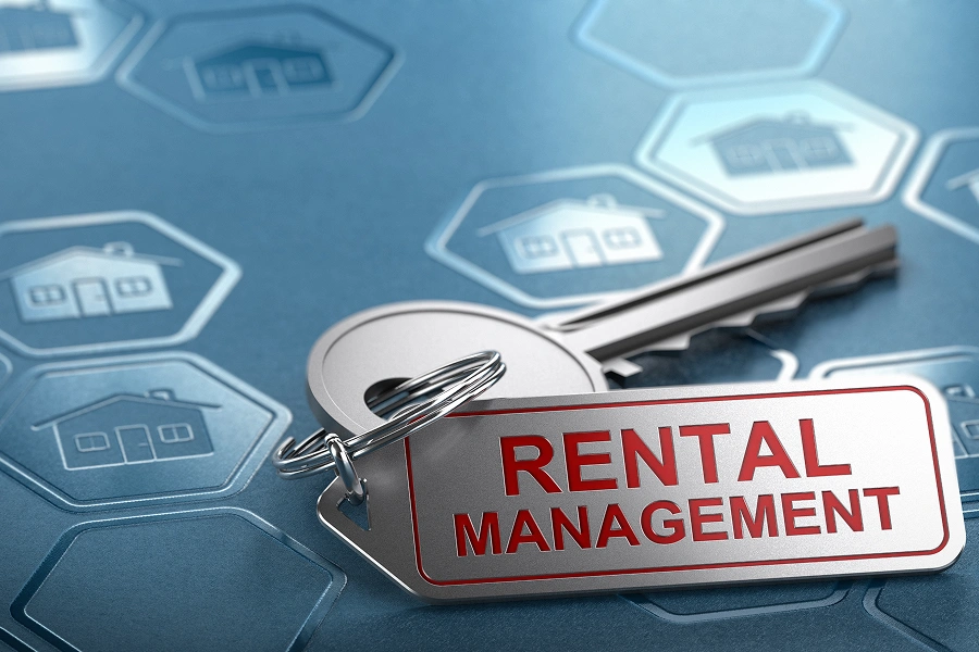 Keys labeled rental management on blue background