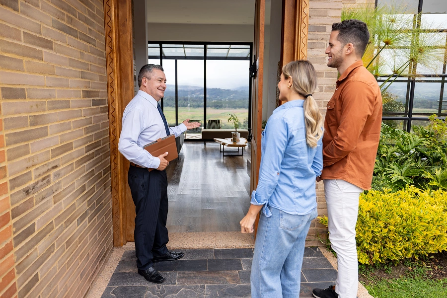Home showing with realtor and prospective buyers